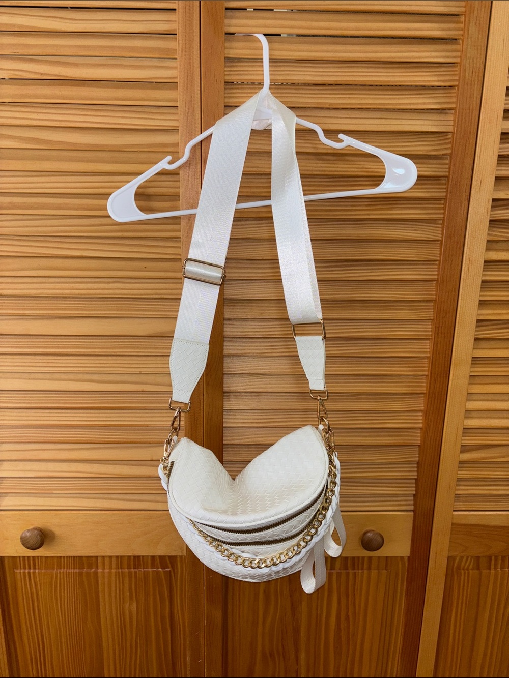 White Crossbody Saddle Bag with Gold Chain Accent